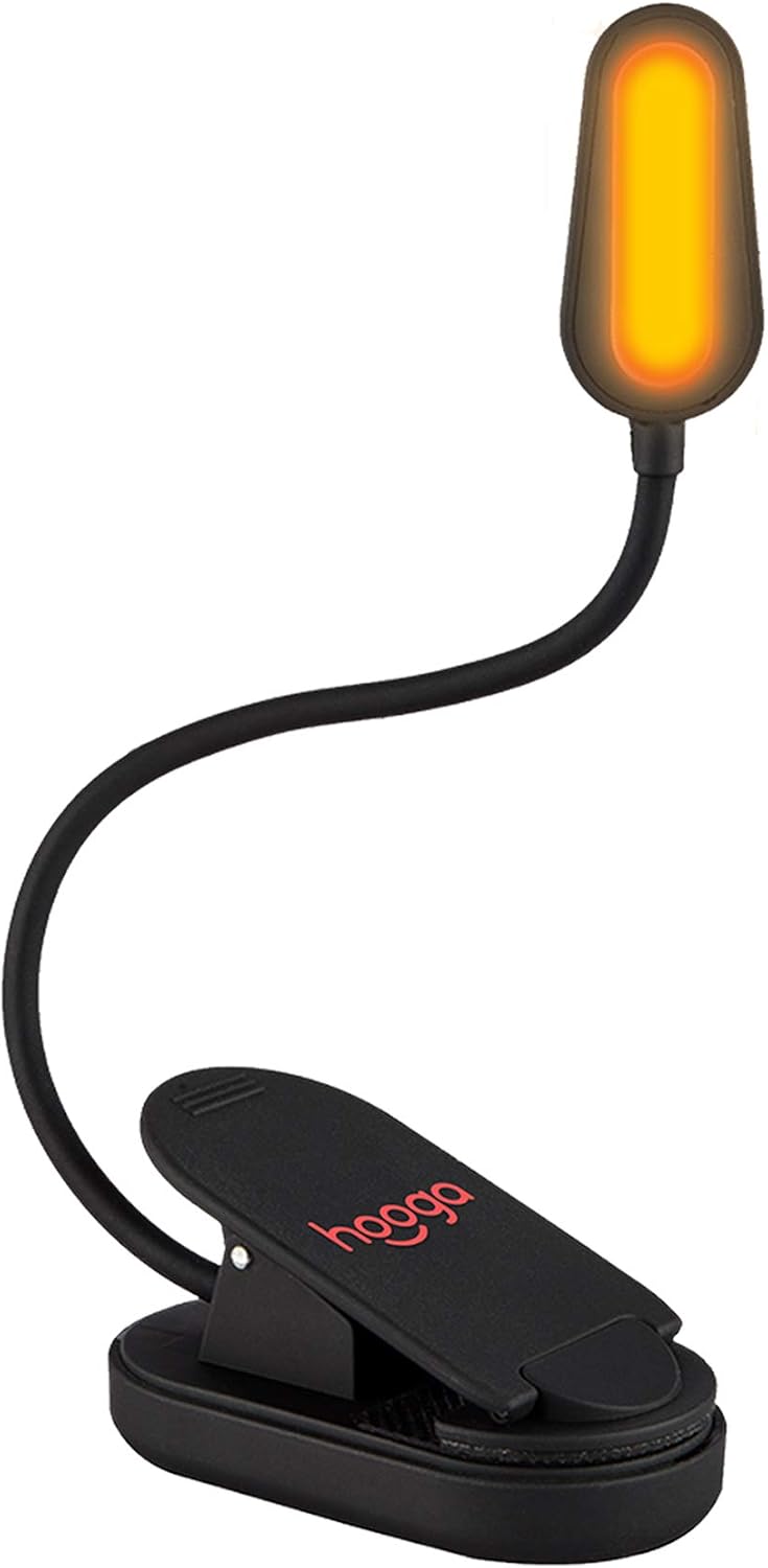 Hooga amber clip-on book light with flexible neck clipped to the cover of a book